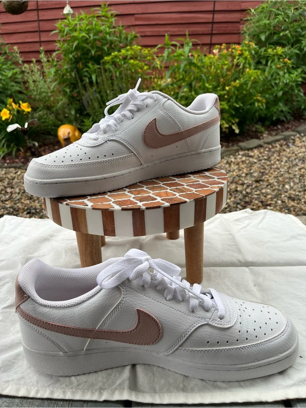 Nike White Low-Top sneakers with pink accents